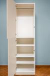 Wardrobe module with clothes rail and shelves